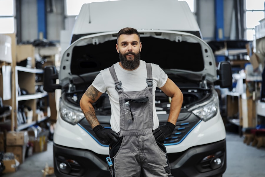 Auto mechanic in workshop